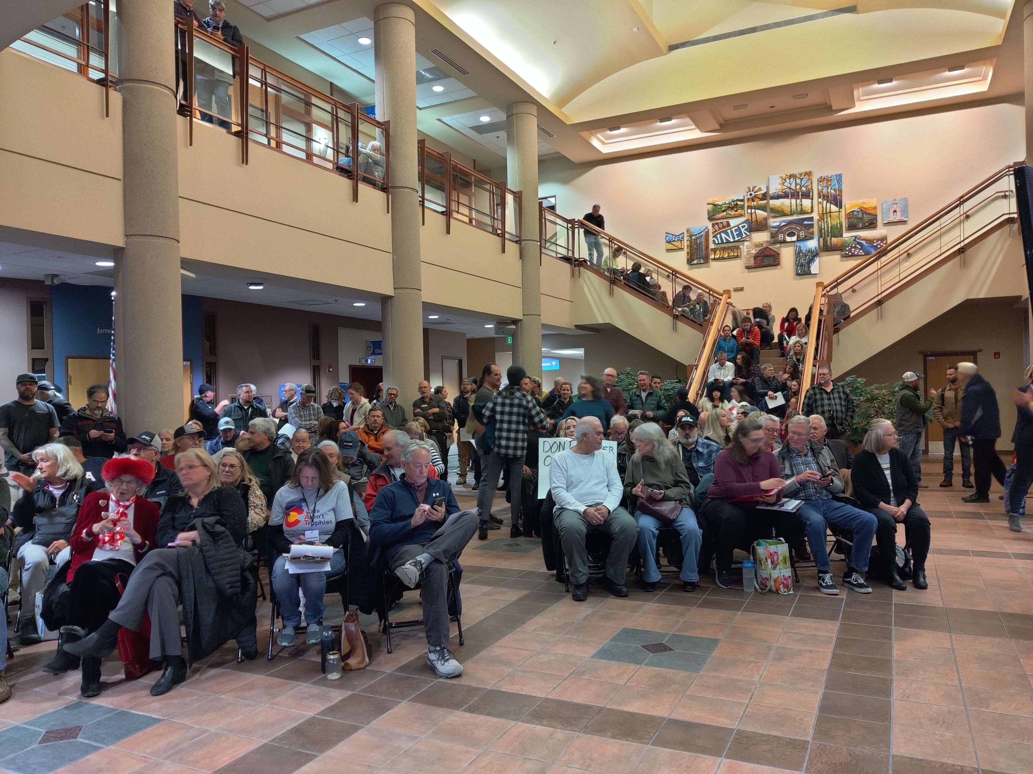 Lakewood residents in overflow seating, waiting to speak